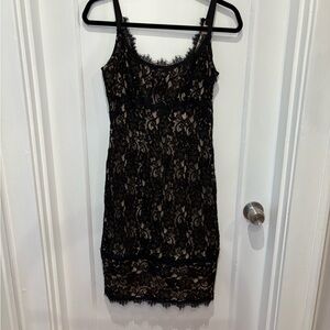 Diane VonFurstenberg black lace dress with nude underlay